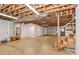 Unfinished basement with garage door and utility hookups at 2274 Old Wilkesboro Rd, Statesville, NC 28625