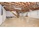 Spacious unfinished basement with open ceiling and stairs to main floor at 2274 Old Wilkesboro Rd, Statesville, NC 28625