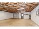 Unfinished basement with garage door and utilities connections at 2274 Old Wilkesboro Rd, Statesville, NC 28625
