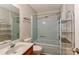 This bathroom features a vanity with storage and a tub/shower combo at 2274 Old Wilkesboro Rd, Statesville, NC 28625