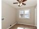 Bedroom features wood-look flooring, a ceiling fan and plenty of natural light at 2274 Old Wilkesboro Rd, Statesville, NC 28625