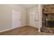 A welcoming entryway with light-colored walls, wood floors, and a stone fireplace visible at 2274 Old Wilkesboro Rd, Statesville, NC 28625