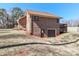 Brick home featuring basement garage access and deck at 2274 Old Wilkesboro Rd, Statesville, NC 28625