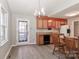Eat-in kitchen with wood cabinets, stainless steel appliances, and modern flooring at 2274 Old Wilkesboro Rd, Statesville, NC 28625