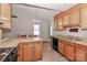 Bright eat-in kitchen with a door to the outside and wood cabinets at 2274 Old Wilkesboro Rd, Statesville, NC 28625