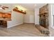 Bright open living room with stone fireplace, hardwood floors, and open access to the kitchen at 2274 Old Wilkesboro Rd, Statesville, NC 28625