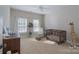 Charming Bedroom with neutral tones, soft carpeting, a cozy crib, and plenty of natural light at 228 Black Mountain Dr, Fort Mill, SC 29708