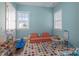 Playroom with natural light, colorful rug, and space for storage at 228 Black Mountain Dr, Fort Mill, SC 29708