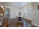 Charming breakfast nook featuring wood floors and bright windows with plantation shutters at 228 Black Mountain Dr, Fort Mill, SC 29708