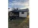 Compact single-story home boasting original siding and an inviting entry at 233 Poag St, Rock Hill, SC 29730