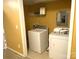 Laundry room with white washer and dryer at 2430 Mt Holly Huntersville Rd, Charlotte, NC 28214