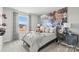 Charming bedroom with a football theme decor, and neutral color palette at 298 Bezelle Ave, York, SC 29745