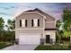 Charming two-story home with stone accents, a two-car garage, and beautifully landscaped front yard at 298 Bezelle Ave, York, SC 29745