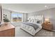 Serene bedroom featuring a king-sized bed, natural light, and stylish decor at 298 Bezelle Ave, York, SC 29745