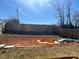 Large backyard with wooden privacy fence at 329 Aniston Ln, Shelby, NC 28152