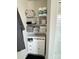 Bathroom with a linen closet and shelving for organized towel and toiletries storage at 329 Aniston Ln, Shelby, NC 28152