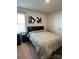 Neutral bedroom with a bed, carpeted floors, natural light, and closet at 329 Aniston Ln, Shelby, NC 28152