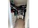Walk-in closet with clothes racks, dresser drawers, carpeted floor and plenty of storage space at 329 Aniston Ln, Shelby, NC 28152