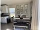 Dining room with natural light, wooden table, and wall art at 329 Aniston Ln, Shelby, NC 28152
