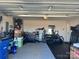 Spacious garage featuring lots of storage and an area for working out at 329 Aniston Ln, Shelby, NC 28152
