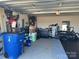 Spacious garage featuring lots of storage and an area for working out at 329 Aniston Ln, Shelby, NC 28152