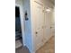 Hallway with closet, access to the bathroom and neutral colored walls at 329 Aniston Ln, Shelby, NC 28152