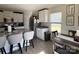 Well-equipped kitchen with granite countertops, stainless steel appliances, and an eat-in dining area at 329 Aniston Ln, Shelby, NC 28152