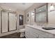 Updated bathroom featuring a shower, modern fixtures, vanity and tile floor at 4219 Kronos Pl, Charlotte, NC 28210