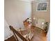 Welcoming two-story foyer featuring hardwood floors, elegant chandelier, and an open office space at 4219 Kronos Pl, Charlotte, NC 28210
