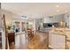 Open concept living space features dining, kitchen and living areas with lots of light at 4219 Kronos Pl, Charlotte, NC 28210