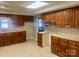 Kitchen with wooden cabinets and tile countertops at 4220 Honeysuckle Rd, Rock Hill, SC 29732