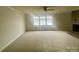 Spacious living room with large windows offering plenty of natural light at 4220 Honeysuckle Rd, Rock Hill, SC 29732