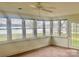 Bright sunroom with lots of windows with a lake view at 4220 Honeysuckle Rd, Rock Hill, SC 29732