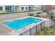 Community pool area featuring crystal-clear water and black metal fencing at 4395 Reed Creek Dr, Sherrills Ford, NC 28673
