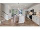 Bright kitchen featuring a large center island with pendant lighting and stainless steel appliances at 4399 Reed Creek Dr, Sherrills Ford, NC 28673