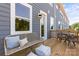 Charming back deck featuring stylish outdoor furniture and seating area with privacy at 4407 Reed Creek Dr, Sherrills Ford, NC 28673