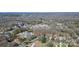 Panoramic aerial view highlighting the property's location near the city and wooded areas at 4607 Carmel Vista Ln, Charlotte, NC 28226