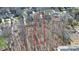 An aerial view of the property line shows plenty of bare trees and foliage at 4607 Carmel Vista Ln, Charlotte, NC 28226