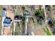 Aerial view showcasing the property's layout, driveway, and surrounding neighborhood at 4607 Carmel Vista Ln, Charlotte, NC 28226