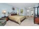 Bedroom showcasing soft blue walls, plush carpet, and stylish furniture at 4607 Carmel Vista Ln, Charlotte, NC 28226
