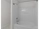 Bright white bathroom featuring a tub and shower combination at 471 Doughton Ln, Charlotte, NC 28217