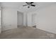 Carpeted bedroom showing a large layout with multiple entrances at 471 Doughton Ln, Charlotte, NC 28217