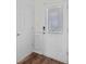 Bright entryway featuring a door with privacy glass and vinyl flooring at 471 Doughton Ln, Charlotte, NC 28217