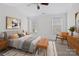 Bright bedroom offers a comfortable bed, neutral decor, and plenty of natural light at 471 Doughton Ln, Charlotte, NC 28217