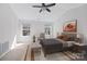Airy main bedroom with a large bed, ample natural light, and contemporary décor at 471 Doughton Ln, Charlotte, NC 28217