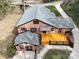 Aerial view of a beautiful brick home with a manicured lawn at 48 Washington Se Ln, Concord, NC 28025