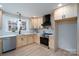 Bright kitchen featuring stainless steel appliances, light wood cabinets, and modern countertops at 48 Washington Se Ln, Concord, NC 28025