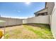 The spacious backyard is fully fenced, offering privacy and a safe play area at 5212 Spanish Ivy Ln, Indian Land, SC 29707