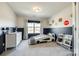 bedroom featuring a car-shaped bed, road-themed wall decor, and neutral carpet at 5212 Spanish Ivy Ln, Indian Land, SC 29707
