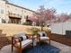 Inviting backyard patio area with stylish seating, perfect for relaxing and outdoor entertaining at 6449 Silver Star Ln, Charlotte, NC 28210